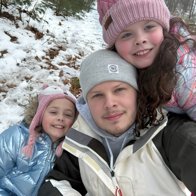  Derrick Levasseur and enjoying time with his two daughters.
